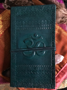 Green leather journal with Om symbol